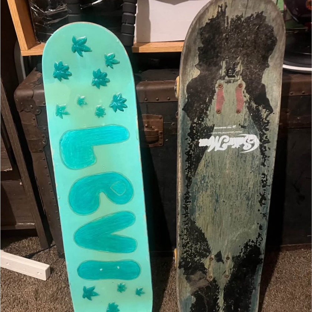 Salomon Snowboard with Bold Graphic and Teal Accents